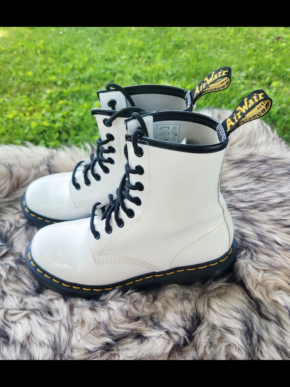 Dr. Martens White Patent 8-Eye Lace-Up Boots with Black Accents